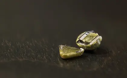 Close up of greenish-tinged diamonds from the lab