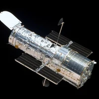 The Hubble Space Telescope as seen from the departing Space Shuttle Atlantis, flying STS-125, HST Servicing Mission 4.