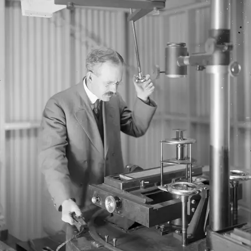 George Ellery Hale at the spectrograph of the 60-foot solar tower telescope, Mount Wilson Observatory.