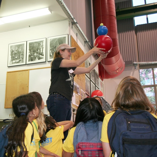 A STEM girls group visits the Carnegie Observatories' machine shop