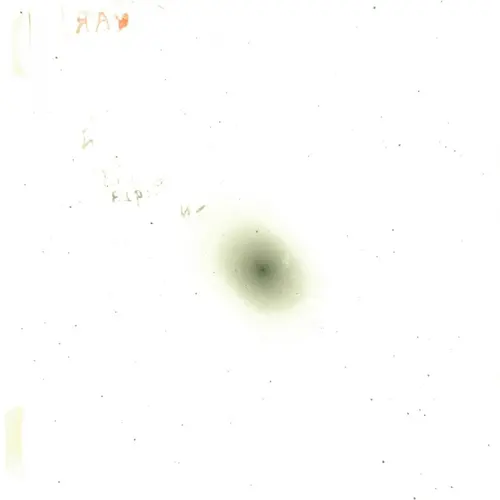 Emulsion side of photographic plate H335H, created by Edwin Hubble with the Hooker 100-inch telescope of the Mount Wilson Observatory.