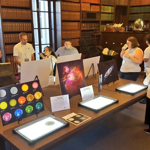 Visitors learn about our history in the Hale Library during the annual Observatories Open House. 